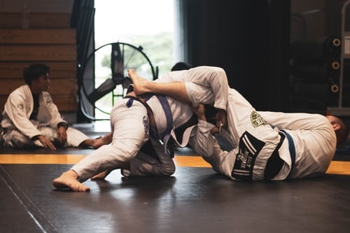 Judo partners sparring during a class