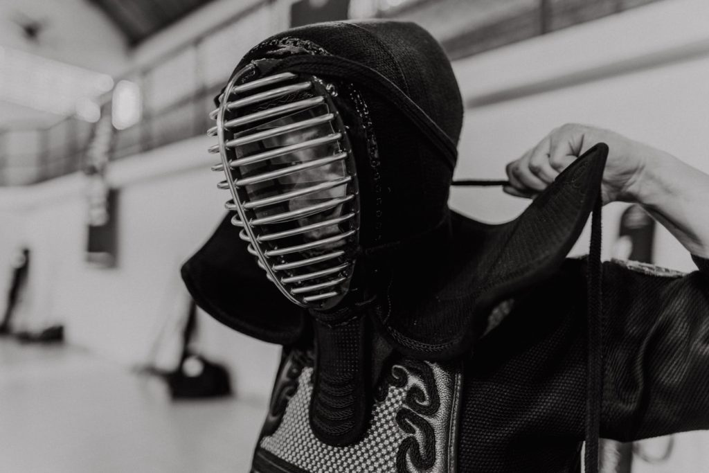 Kendo instructor posing with Dogi and Bogu